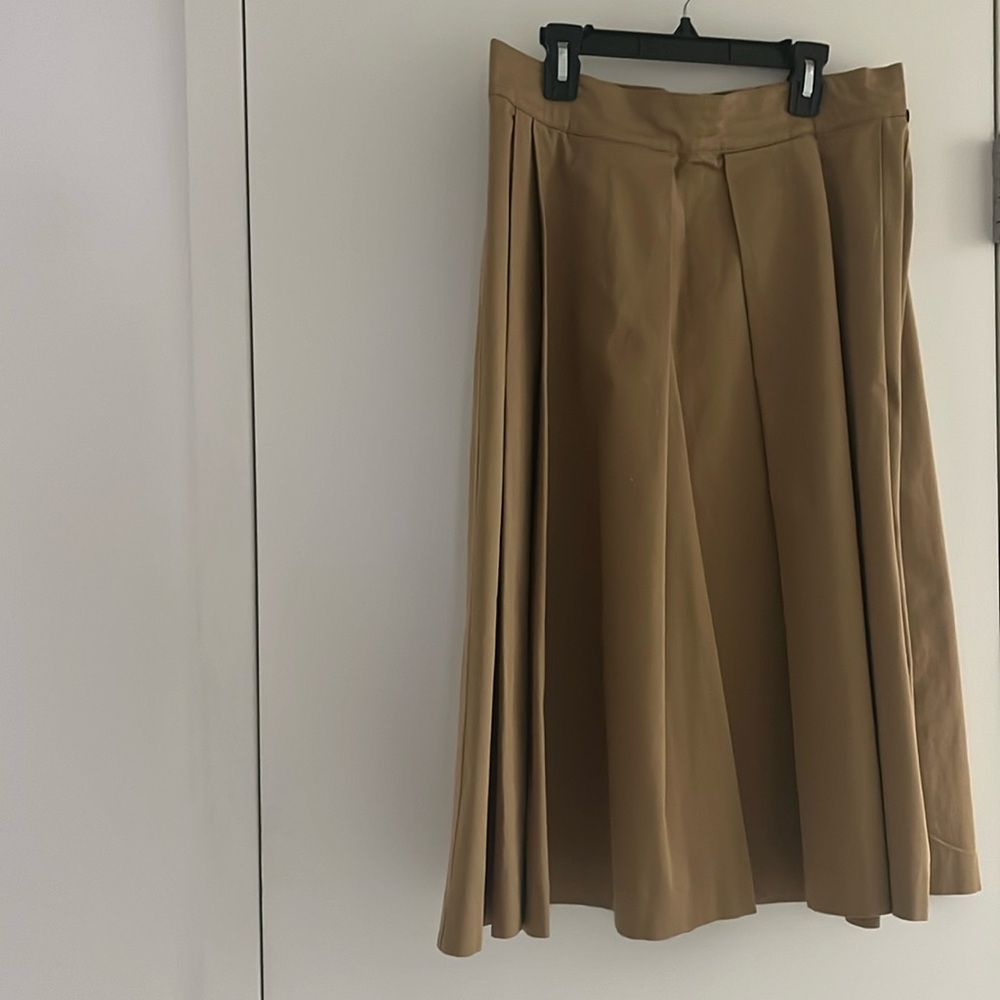 Midi skirt with pleates in A-silhouette. Size US8. Excellent condition.